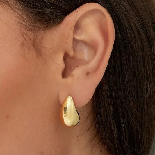 Nikita Water Drop Gold Statement Earrings